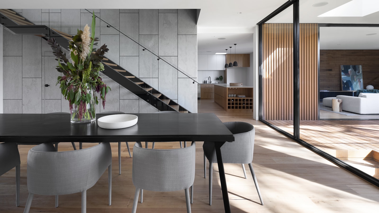 A bright, tidy living room interior of the kind that needs a working smoke alarm nearby.