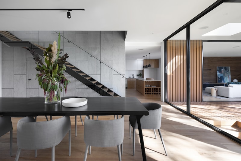 A bright, tidy living room interior of the kind that needs a working smoke alarm nearby.
